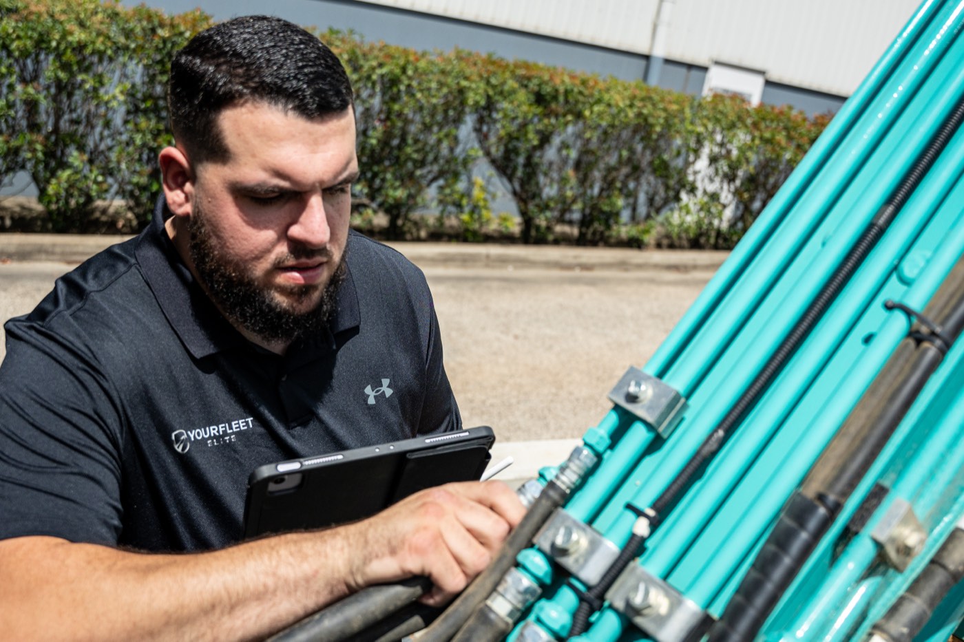 Assessing plant equipment on a tablet for fleet insurance
