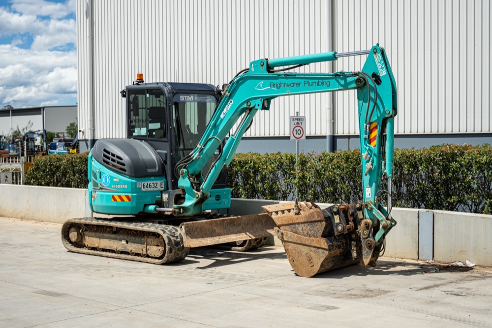 Compact excavator managed as part of a business equipment fleet