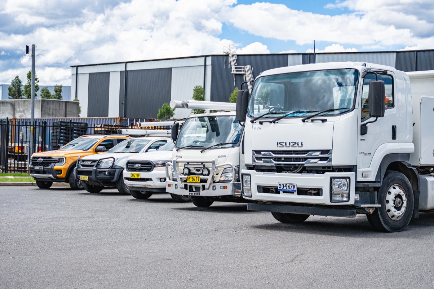 Isuzu heavy truck parked at the front of a managed fleet
