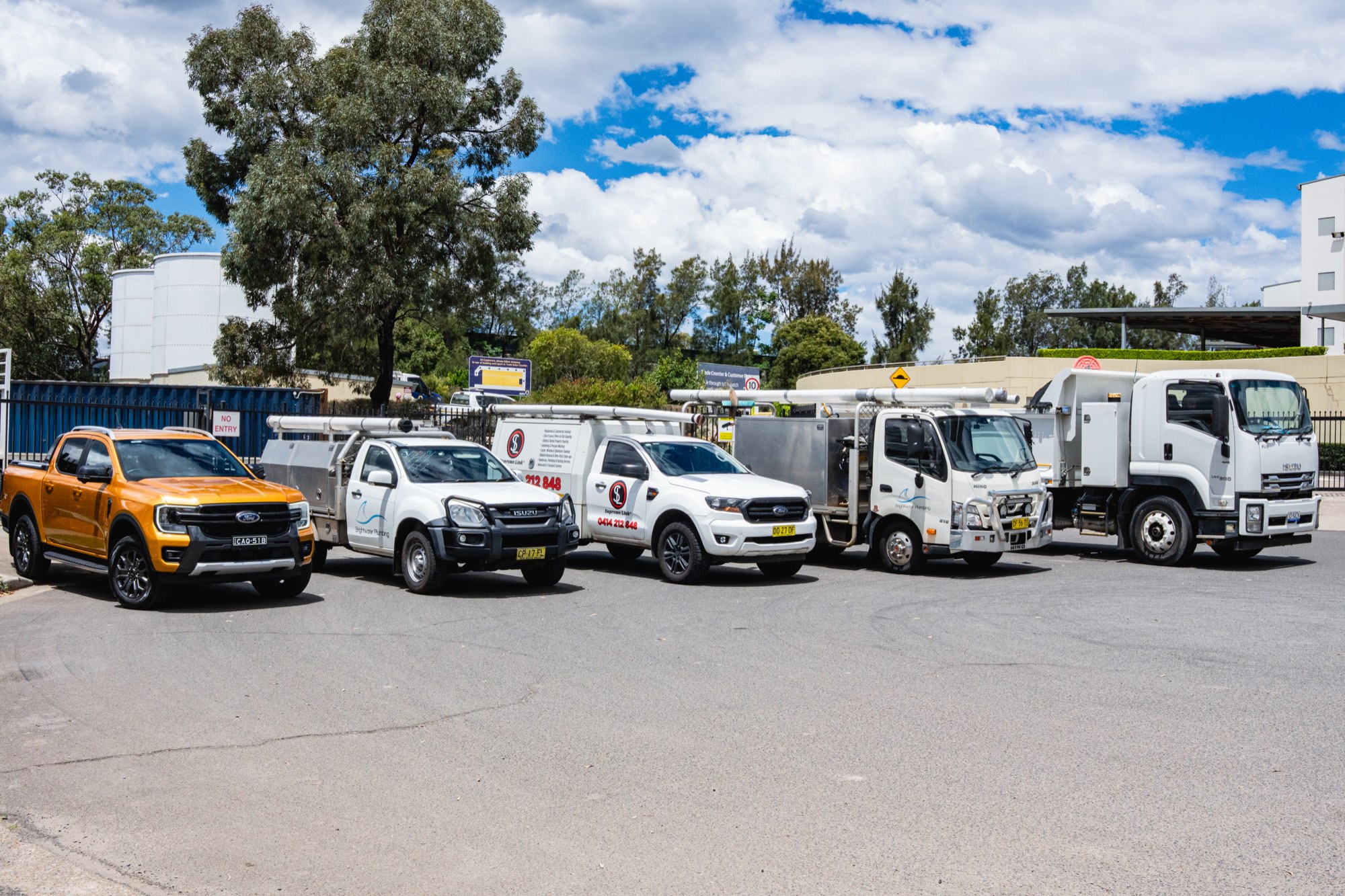 Your Fleet Elite managed fleet of utes and trucks lined up at a Western Sydney yard