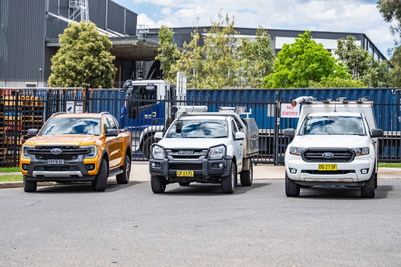 Three work utes from a managed fleet lined up side by side